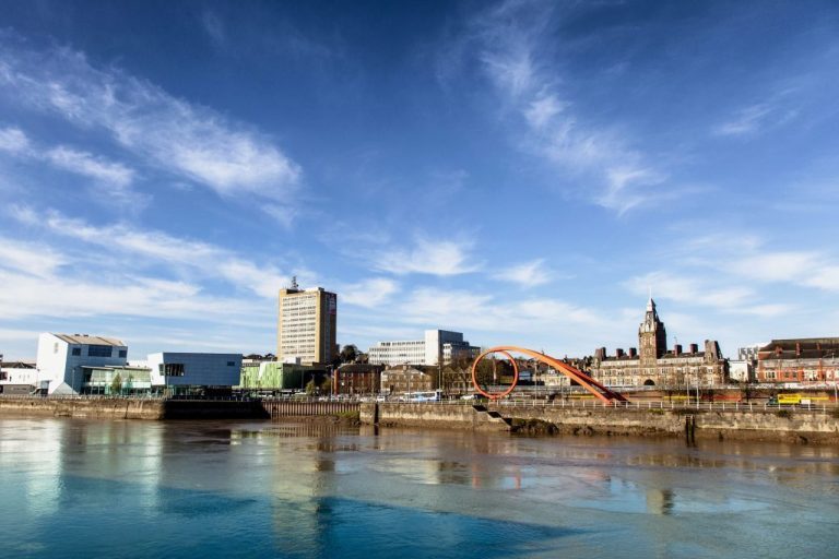 RestoraBath Newport A photo of Newport city centre with the wave and building behind it